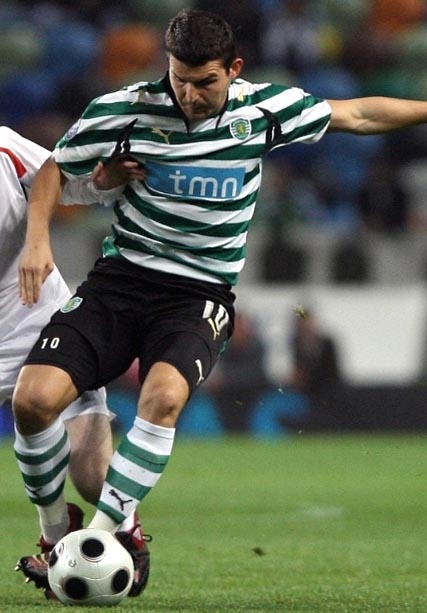 SPORTING-07-08-PUMA-home-stripe-black-stripe2.JPG
